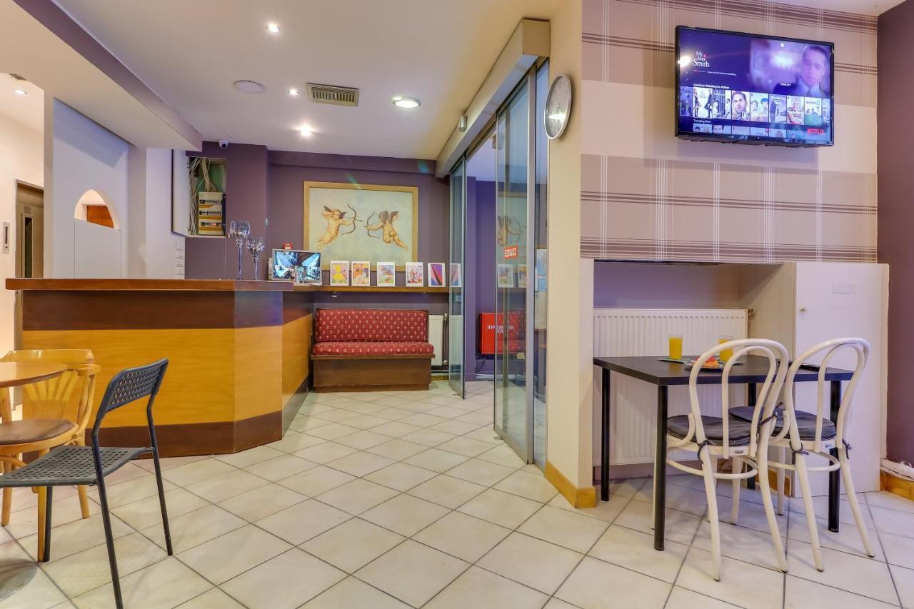 Hoteleros Dionysos Athens Atene Esterno foto